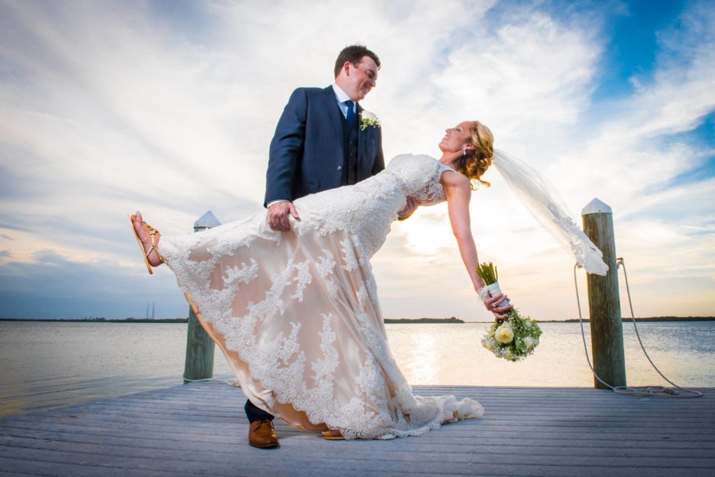 Bride and Groom Dipping on a Dock